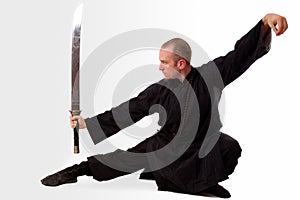 Martial arts teacher with sword