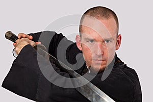 Martial arts teacher with sword close-up