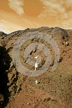 Martian base diorama whith astronauts exploring Mars on a natural landscape