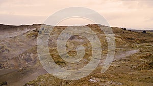 Martian landscape geothermal activity, hot steam erupts from the ground, Iceland,