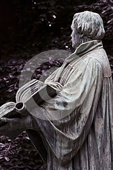 Martin Luther holding a bible, bronze statue