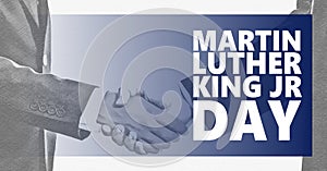 Martin Luther King jr day. White and black handshaking background photo