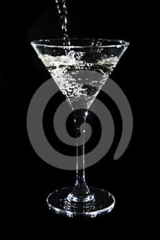 Martini being poured into a glass