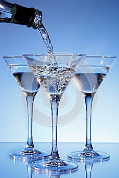Martini being poured into a glass