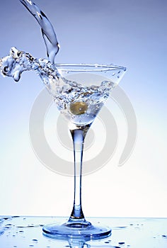 Martini being poured into a glass