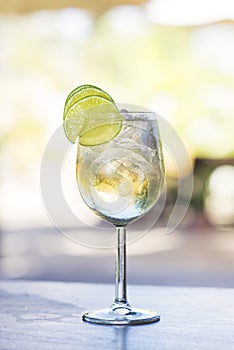 Martini bianco vermouth spritzer with lime photo