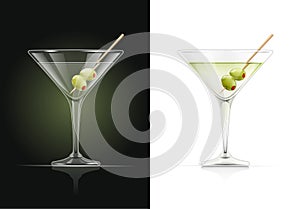 Martini glass. Cocktail with olive. photo