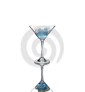 Martini glass with ice isolated on white