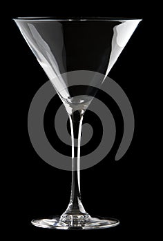 Martini glass isolated on a black background.