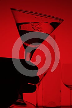 Martini glass on red background