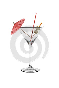 A martini glass with a straw, parasol and olives isolated on a white background
