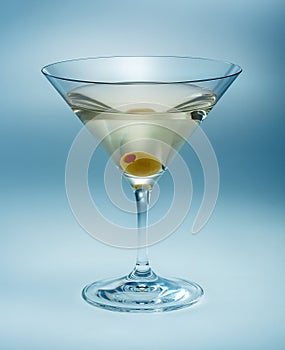 Martini with olive isolated. vermouth photo