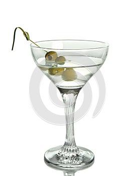 Martini with olives in a martini glass, isolated on white background