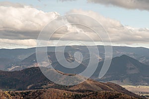 Martinske hole on Mala Fatra mountains from hiking trail bellow Kecka hill in autumn Sulovske skaly mountains in Slovakia photo