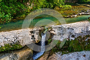 MARTVILI, GEORGIA: Landscape with a view of a beautiful waterfall in the Martvili Canyon on a summer day.