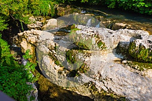 MARTVILI, GEORGIA: Landscape with a view of a beautiful waterfall in the Martvili Canyon on a summer day.