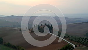 Marvelous aerial view flight drone House podere Belvedere foggy morning Tuscany