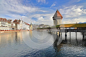 Marvelous historic city center of Lucerne with the old wooden Chapel Bridge and the old Water Tower. Lucerne, Switzerland, Europe.