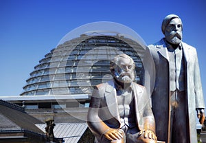 Marx and Engels and the Reichstag in Berlin photo