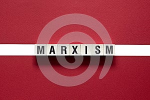 Marxism word concept on cubes photo