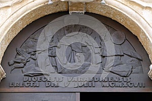 Mary assumed into Heaven, detail of the entrance door of cathedral of Assumption in Varazdin, Croatia photo