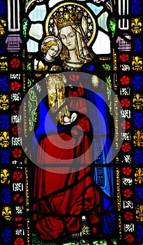 Mary with baby Jesus in her arms (stained glass)