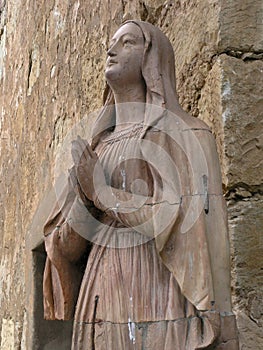 Mary, carved stone statue