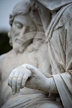 Vertical image of Jesus and Mary in Victorian cemetery pieta statue photo