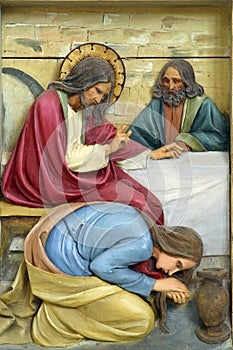 Mary Magdalene washes the feet of Jesus
