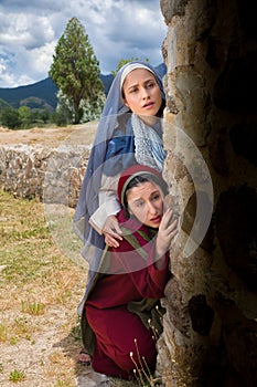 Mary and Mary Magdalene looking into the empty tomb photo