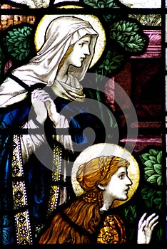 Mary and Mary Magdalene in a stained glass window