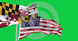 Maryland flag waving in the wind with the american national flag on green screen