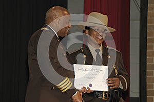 Maryland Park Police Chief  presents a letter of commendation