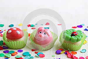 Marzipan pig,mushroom and cloverleaf photo