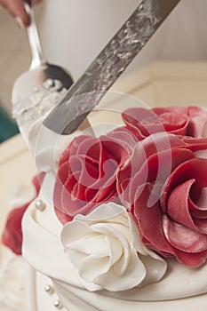 Marzipan red rose on wedding cake