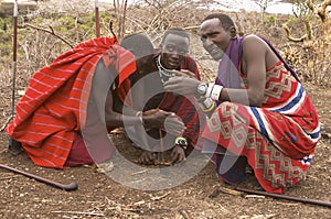 Masai warriors lighting fire