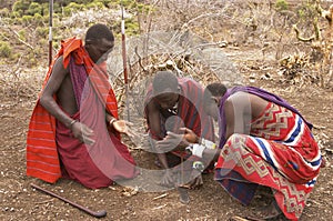 Masai warriors lighting fire