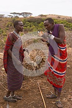 Masai warriors lighting fire
