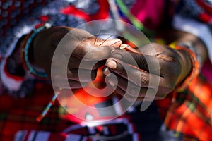 Masai woman beading