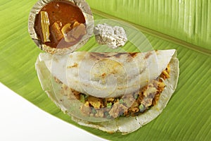 Masala Dosa Stuffed With potato Masala, Chutney And Sambhar