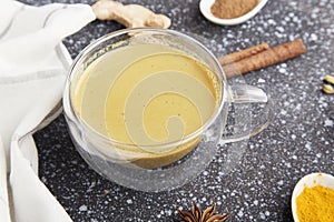Masala tea with star anise, cinnamon, turmeric spices. Healthy traditional indian organic drink flat lay