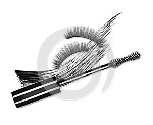 Mascara brush, false eyelashes and cosmetic black stroke