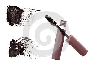 Mascara brush, tube and strokes
