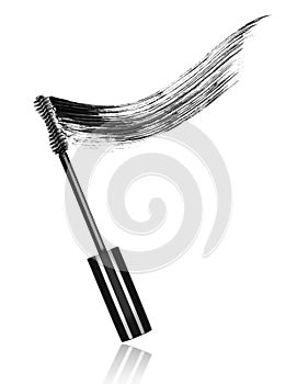 Mascara brushes with mascara stroke close-up, isolated on white