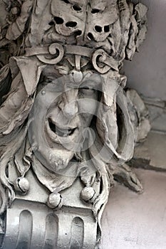 The mascaron on the old building facade in Lviv, Ukraine