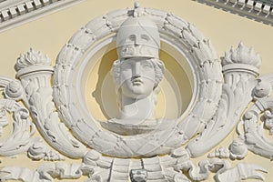 Mascaron of Pallas Athena on old building facade in Kyiv Ukraine