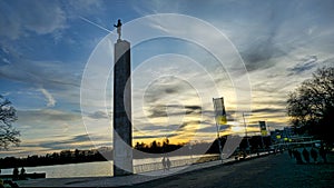 Maschsee hannover torchbearer column at beautiful colorful sunset photo