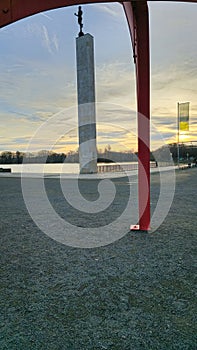 Maschsee hannover torchbearer column at beautiful colorful sunset photo