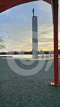 Maschsee hannover torchbearer column at beautiful colorful sunset photo