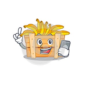 Mascot design of banana fruit box speaking on phone
